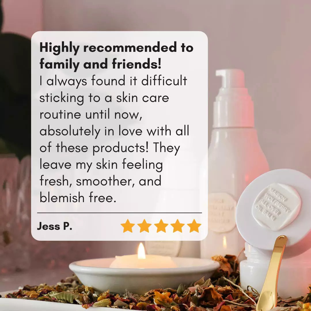 5/5 customer review of skincare set with skincare bottles and jar in background